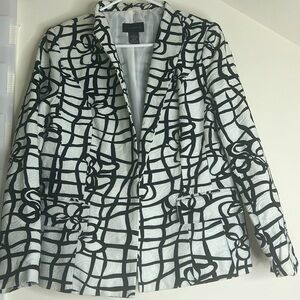 Très jolie jacket blanc et noir neuf et de très bonne qualité